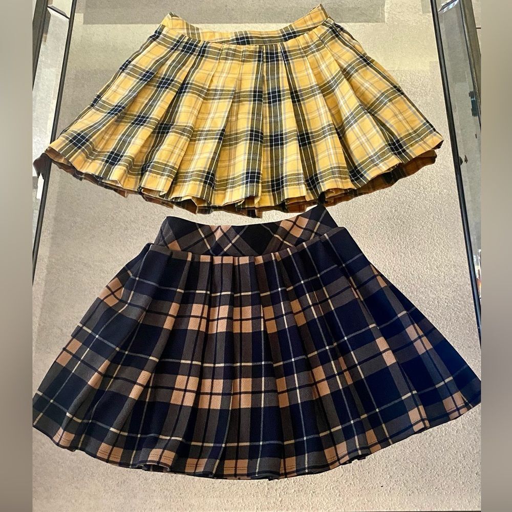 Bundle of pleaded plaid mini skirts